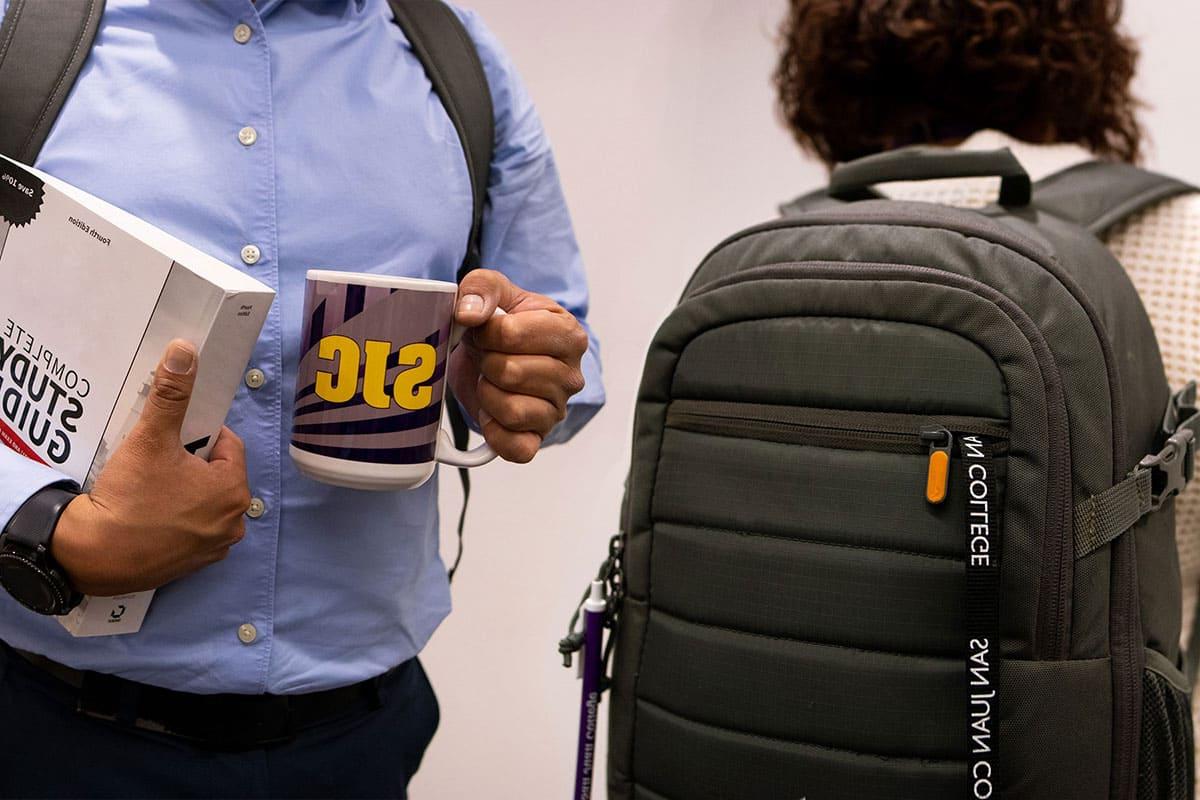 Two Center for Workforce Development students on their way to a customized training program